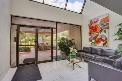 4th FLOOR CONDO WITH SOUTH EXPOSURE OFF THE SCREENED BALCONY on The Country Club At Boca Raton in Florida - for sale on GolfHomes.com, golf home, golf lot