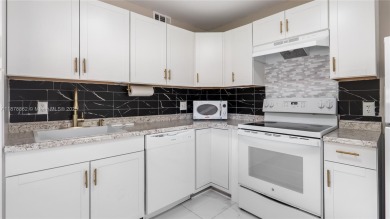 Beautifully upgraded 2BR/2BA corner unit in Century Village, a on Flamingo Lakes Country Club in Florida - for sale on GolfHomes.com, golf home, golf lot
