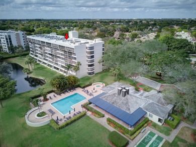 4th FLOOR CONDO WITH SOUTH EXPOSURE OFF THE SCREENED BALCONY on The Country Club At Boca Raton in Florida - for sale on GolfHomes.com, golf home, golf lot