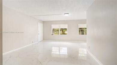 Beautifully upgraded 2BR/2BA corner unit in Century Village, a on Flamingo Lakes Country Club in Florida - for sale on GolfHomes.com, golf home, golf lot