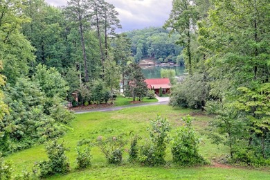 Welcome to this charming one-level home, perfectly situated to on Mountain Harbour Golf Club in North Carolina - for sale on GolfHomes.com, golf home, golf lot
