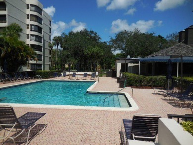 4th FLOOR CONDO WITH SOUTH EXPOSURE OFF THE SCREENED BALCONY on The Country Club At Boca Raton in Florida - for sale on GolfHomes.com, golf home, golf lot