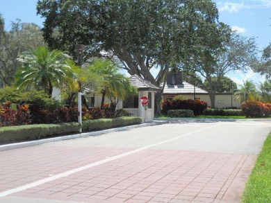 4th FLOOR CONDO WITH SOUTH EXPOSURE OFF THE SCREENED BALCONY on The Country Club At Boca Raton in Florida - for sale on GolfHomes.com, golf home, golf lot