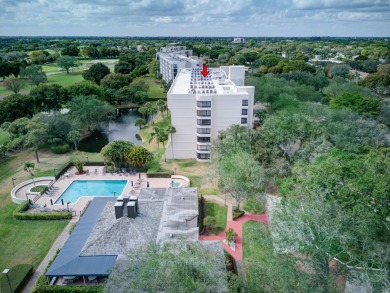 4th FLOOR CONDO WITH SOUTH EXPOSURE OFF THE SCREENED BALCONY on The Country Club At Boca Raton in Florida - for sale on GolfHomes.com, golf home, golf lot