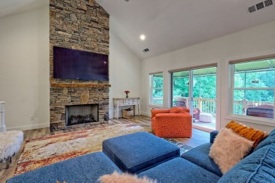 Welcome to this charming one-level home, perfectly situated to on Mountain Harbour Golf Club in North Carolina - for sale on GolfHomes.com, golf home, golf lot