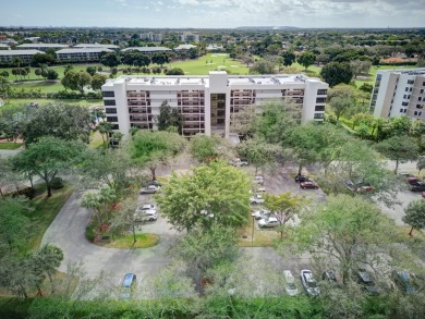 4th FLOOR CONDO WITH SOUTH EXPOSURE OFF THE SCREENED BALCONY on The Country Club At Boca Raton in Florida - for sale on GolfHomes.com, golf home, golf lot