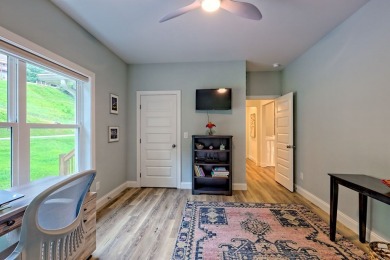 Welcome to this charming one-level home, perfectly situated to on Mountain Harbour Golf Club in North Carolina - for sale on GolfHomes.com, golf home, golf lot