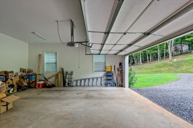 Welcome to this charming one-level home, perfectly situated to on Mountain Harbour Golf Club in North Carolina - for sale on GolfHomes.com, golf home, golf lot