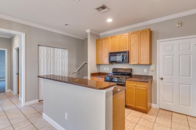 Spacious and airy End Unit Townhome with first floor Primary on Southwood Golf Club in Florida - for sale on GolfHomes.com, golf home, golf lot