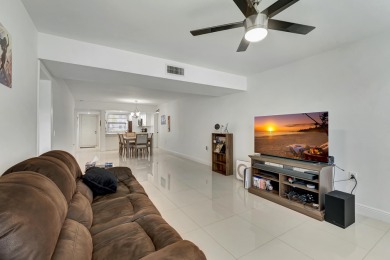Beautiful Corner unit , fully RENOVATED. Updated with large on The Country Club At Boca Raton in Florida - for sale on GolfHomes.com, golf home, golf lot