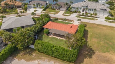 Discover coastal elegance in this beautifully remodeled Home on on Island Country Club in Florida - for sale on GolfHomes.com, golf home, golf lot