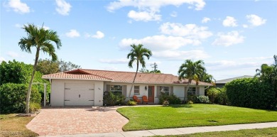 Discover coastal elegance in this beautifully remodeled Home on on Island Country Club in Florida - for sale on GolfHomes.com, golf home, golf lot