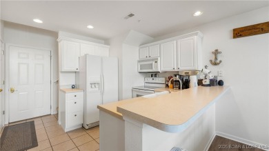 The best value for condo living! Come see the BIG lake views on The Club At Old Kinderhook in Missouri - for sale on GolfHomes.com, golf home, golf lot