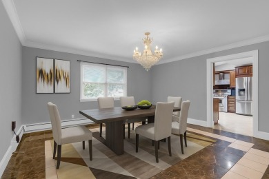 Welcome to this timeless 5-bedroom, 2.5-bath colonial brimming on Middle Bay Country Club in New York - for sale on GolfHomes.com, golf home, golf lot