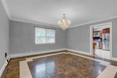 Welcome to this timeless 5-bedroom, 2.5-bath colonial brimming on Middle Bay Country Club in New York - for sale on GolfHomes.com, golf home, golf lot