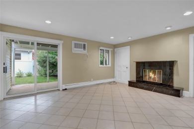 Welcome to this timeless 5-bedroom, 2.5-bath colonial brimming on Middle Bay Country Club in New York - for sale on GolfHomes.com, golf home, golf lot