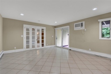 Welcome to this timeless 5-bedroom, 2.5-bath colonial brimming on Middle Bay Country Club in New York - for sale on GolfHomes.com, golf home, golf lot