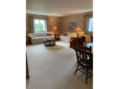 Spacious 2 bedroom end condo with beautiful view overlooking on Swan Valley Golf Club in Michigan - for sale on GolfHomes.com, golf home, golf lot