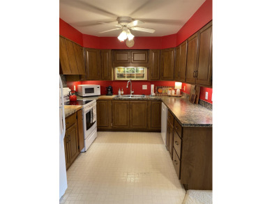 Spacious 2 bedroom end condo with beautiful view overlooking on Swan Valley Golf Club in Michigan - for sale on GolfHomes.com, golf home, golf lot