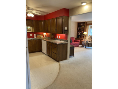 Spacious 2 bedroom end condo with beautiful view overlooking on Swan Valley Golf Club in Michigan - for sale on GolfHomes.com, golf home, golf lot