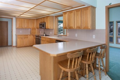 Estate sale on this ranch home situated on a double lot on the on Red Lodge Golf Club in Montana - for sale on GolfHomes.com, golf home, golf lot