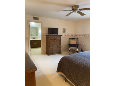 Spacious 2 bedroom end condo with beautiful view overlooking on Swan Valley Golf Club in Michigan - for sale on GolfHomes.com, golf home, golf lot