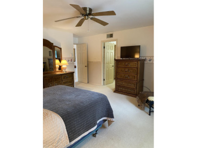 Spacious 2 bedroom end condo with beautiful view overlooking on Swan Valley Golf Club in Michigan - for sale on GolfHomes.com, golf home, golf lot