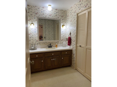 Spacious 2 bedroom end condo with beautiful view overlooking on Swan Valley Golf Club in Michigan - for sale on GolfHomes.com, golf home, golf lot