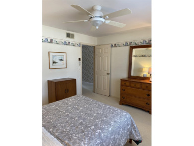Spacious 2 bedroom end condo with beautiful view overlooking on Swan Valley Golf Club in Michigan - for sale on GolfHomes.com, golf home, golf lot