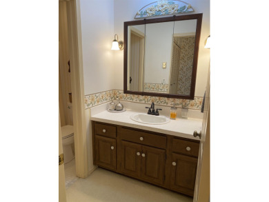 Spacious 2 bedroom end condo with beautiful view overlooking on Swan Valley Golf Club in Michigan - for sale on GolfHomes.com, golf home, golf lot