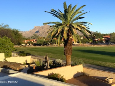 Nestled within the prestigious Omni Tucson National community on Omni Tucson National Golf Resort and Spa - Sonoran in Arizona - for sale on GolfHomes.com, golf home, golf lot