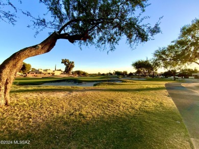 Nestled within the prestigious Omni Tucson National community on Omni Tucson National Golf Resort and Spa - Sonoran in Arizona - for sale on GolfHomes.com, golf home, golf lot