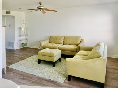 Charming 1st floor corner unit condominium One bedroom one- and on The American Golf Club in Florida - for sale on GolfHomes.com, golf home, golf lot