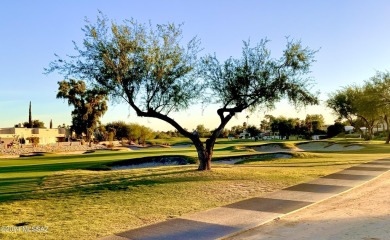 Nestled within the prestigious Omni Tucson National community on Omni Tucson National Golf Resort and Spa - Sonoran in Arizona - for sale on GolfHomes.com, golf home, golf lot