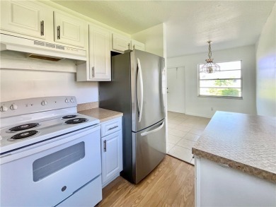 Charming 1st floor corner unit condominium One bedroom one- and on The American Golf Club in Florida - for sale on GolfHomes.com, golf home, golf lot