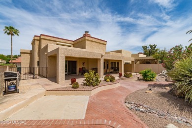 Nestled within the prestigious Omni Tucson National community on Omni Tucson National Golf Resort and Spa - Sonoran in Arizona - for sale on GolfHomes.com, golf home, golf lot