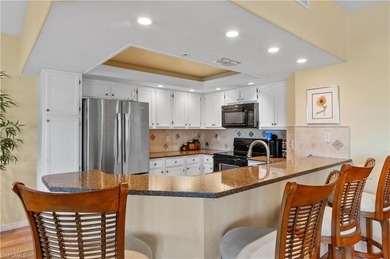 This beautiful carriage home offers spectacular view of the 13th on Worthington Country Club in Florida - for sale on GolfHomes.com, golf home, golf lot