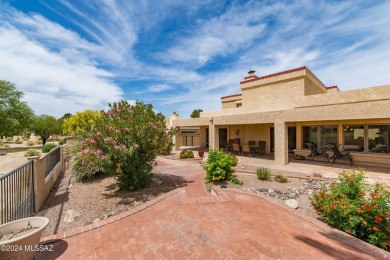 Nestled within the prestigious Omni Tucson National community on Omni Tucson National Golf Resort and Spa - Sonoran in Arizona - for sale on GolfHomes.com, golf home, golf lot