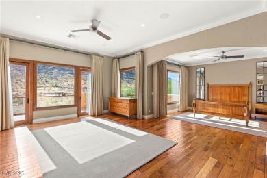 Cradled by the Red Rock Mountains, this exceptional estate on Red Rock Country Club in Nevada - for sale on GolfHomes.com, golf home, golf lot