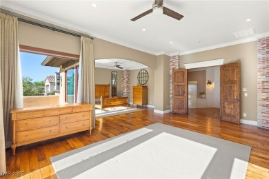 Cradled by the Red Rock Mountains, this exceptional estate on Red Rock Country Club in Nevada - for sale on GolfHomes.com, golf home, golf lot