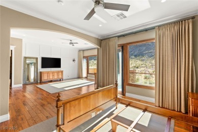 Cradled by the Red Rock Mountains, this exceptional estate on Red Rock Country Club in Nevada - for sale on GolfHomes.com, golf home, golf lot