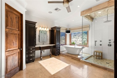 Cradled by the Red Rock Mountains, this exceptional estate on Red Rock Country Club in Nevada - for sale on GolfHomes.com, golf home, golf lot