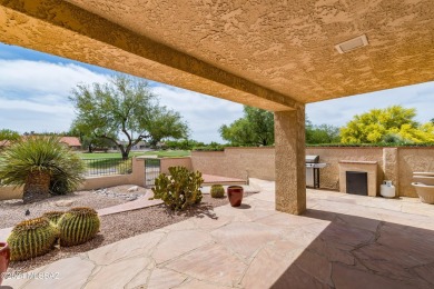 Nestled within the prestigious Omni Tucson National community on Omni Tucson National Golf Resort and Spa - Sonoran in Arizona - for sale on GolfHomes.com, golf home, golf lot