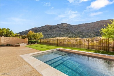 Cradled by the Red Rock Mountains, this exceptional estate on Red Rock Country Club in Nevada - for sale on GolfHomes.com, golf home, golf lot