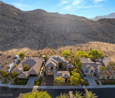 Cradled by the Red Rock Mountains, this exceptional estate on Red Rock Country Club in Nevada - for sale on GolfHomes.com, golf home, golf lot