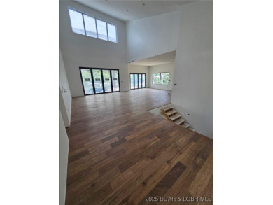 BRAND NEW CONSTRUCTION located on the 3 Mile Marker of Horseshoe on Seasons Ridge At Four Seasons in Missouri - for sale on GolfHomes.com, golf home, golf lot