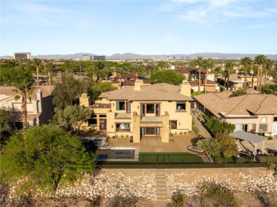 Cradled by the Red Rock Mountains, this exceptional estate on Red Rock Country Club in Nevada - for sale on GolfHomes.com, golf home, golf lot