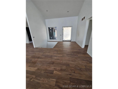BRAND NEW CONSTRUCTION located on the 3 Mile Marker of Horseshoe on Seasons Ridge At Four Seasons in Missouri - for sale on GolfHomes.com, golf home, golf lot