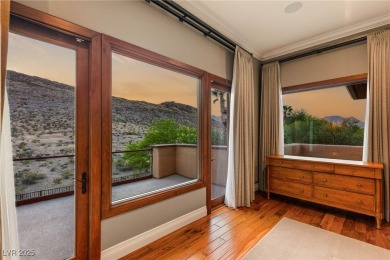 Cradled by the Red Rock Mountains, this exceptional estate on Red Rock Country Club in Nevada - for sale on GolfHomes.com, golf home, golf lot