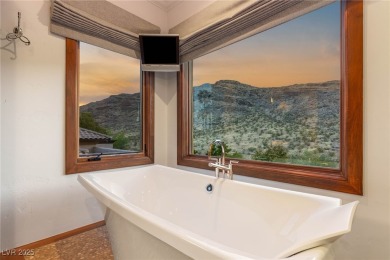Cradled by the Red Rock Mountains, this exceptional estate on Red Rock Country Club in Nevada - for sale on GolfHomes.com, golf home, golf lot